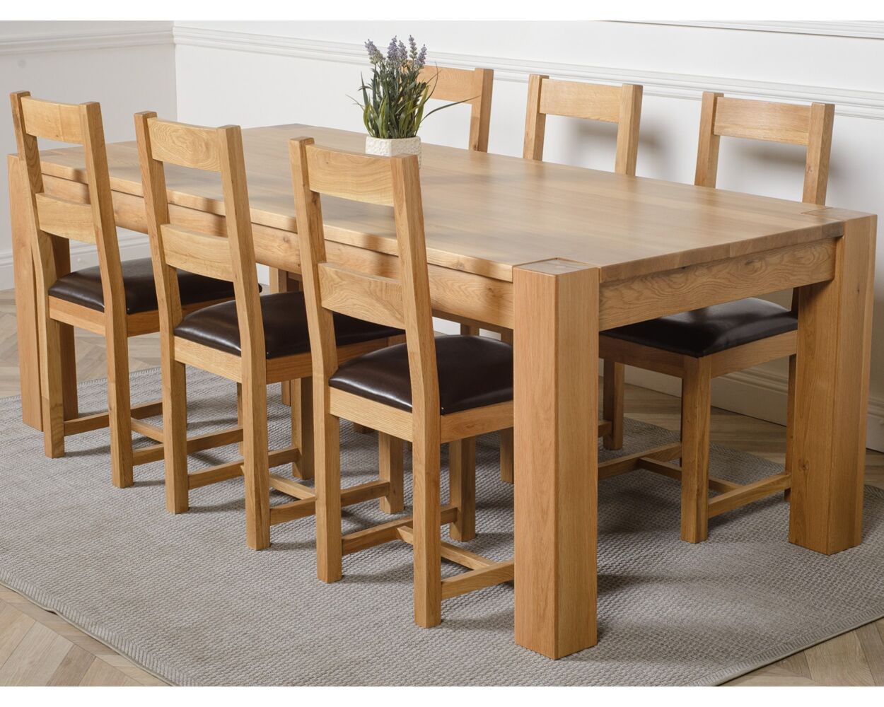 https://www.thatsfurniture.co.uk/media/catalog/product/cache/79d0c862bdeeda8182459d35d8e05bcd/k/u/kuba-extra-large-oak-dining-table-with-6-lincoln-oak-chairs-brown-leather_1.jpg